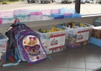 Luther Collision and Glass school supply drive